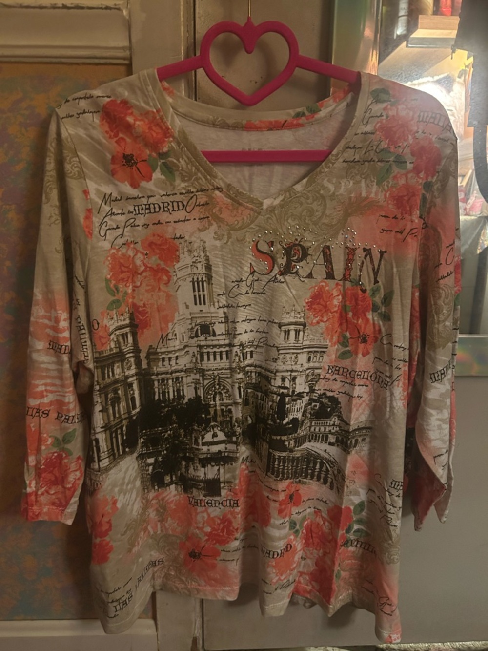 American vintage style 3/4 length sleeve shirt . Has rhinestones . Size XL